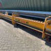 Adjustable spreader beam